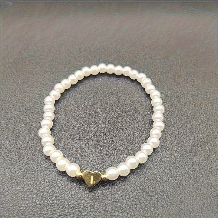 Elegante bracciale con iniziale a forma di cuore (A-Z)