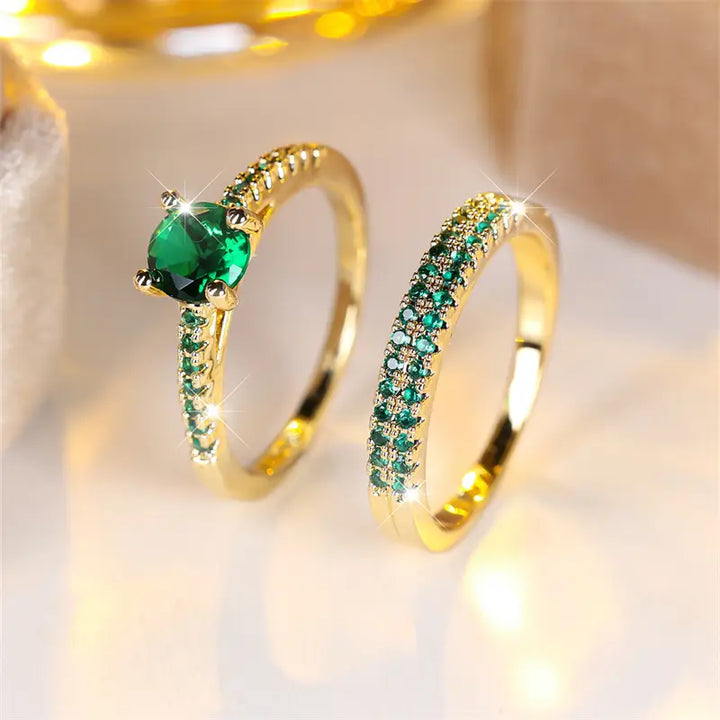 Set di due anelli con smeraldo in oro