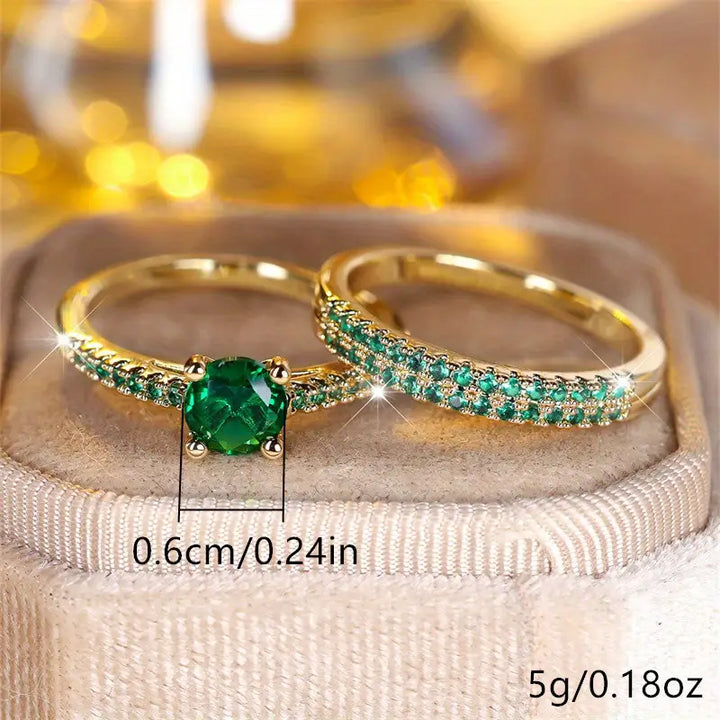 Set di due anelli con smeraldo in oro