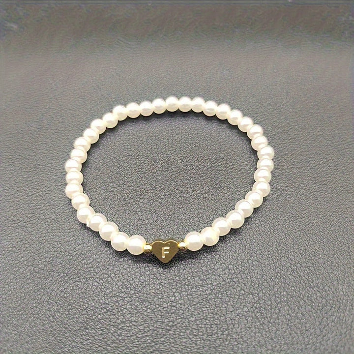 Elegante bracciale con iniziale a forma di cuore (A-Z)