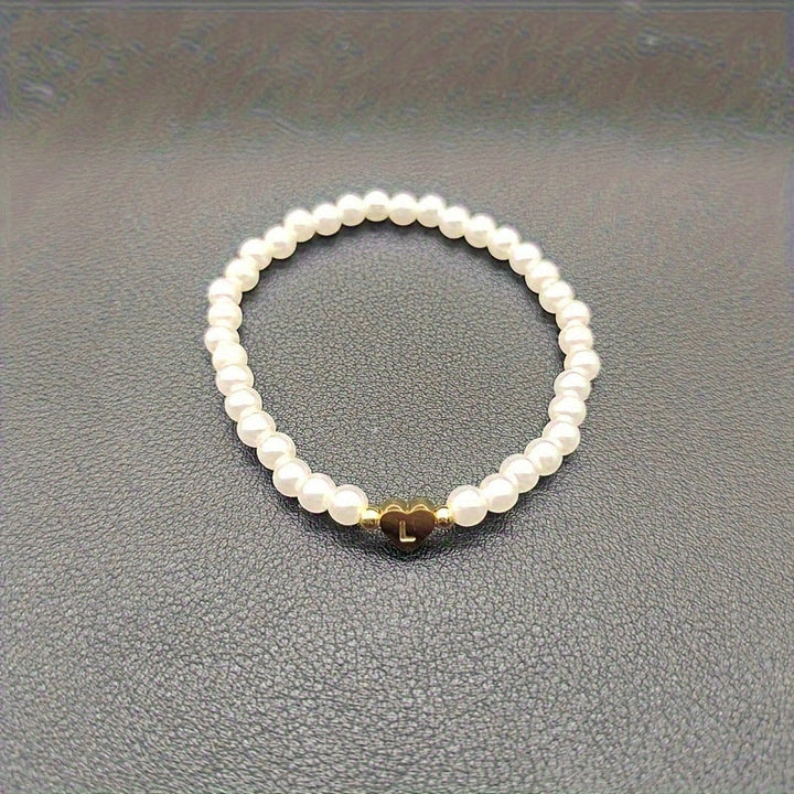 Elegante bracciale con iniziale a forma di cuore (A-Z)