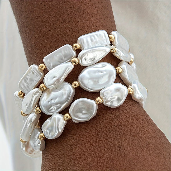 Set di 4 braccialetti con perline