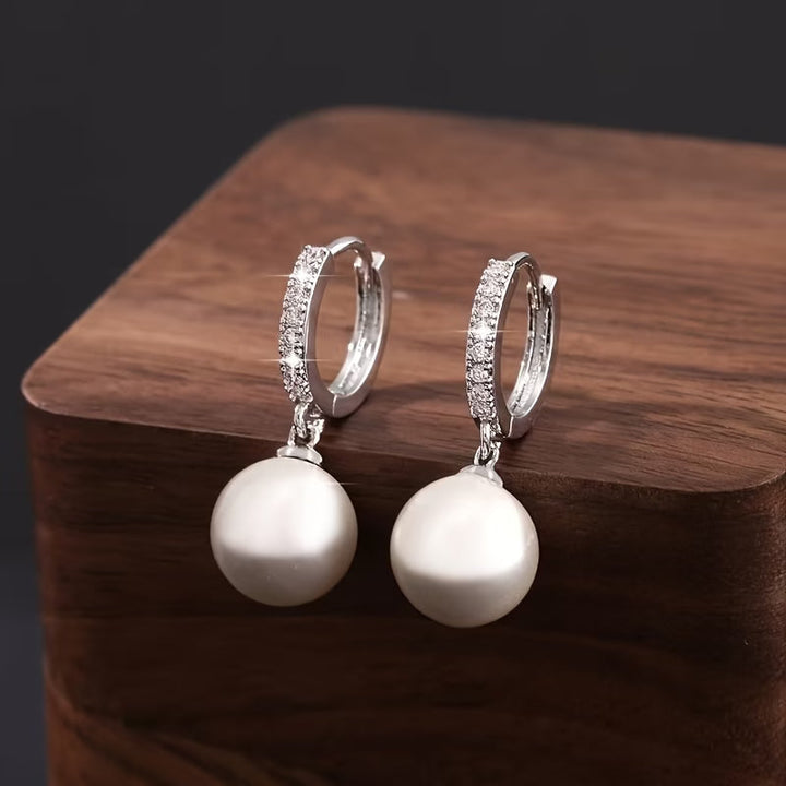 Boucles d'oreilles pendantes perles modernes