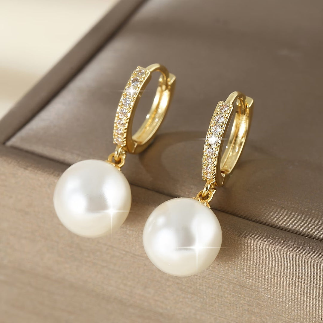 Boucles d'oreilles pendantes perles modernes