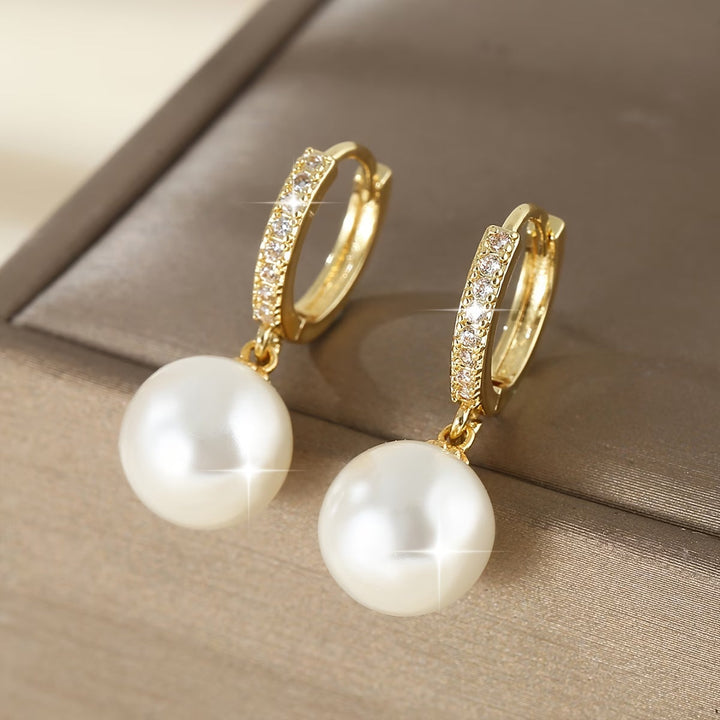 Boucles d'oreilles pendantes perles modernes
