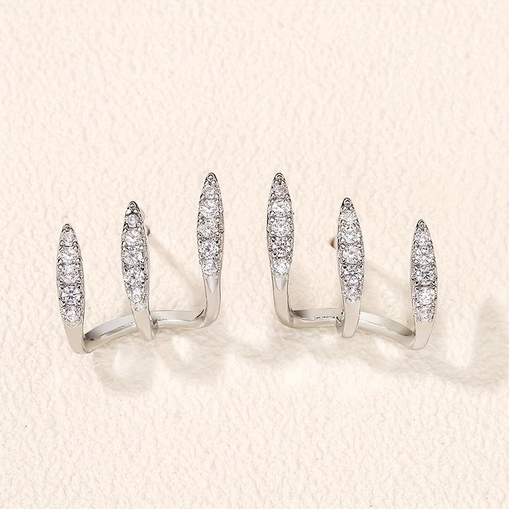 Elegante Ohrringe mit drei Krappen und Strass