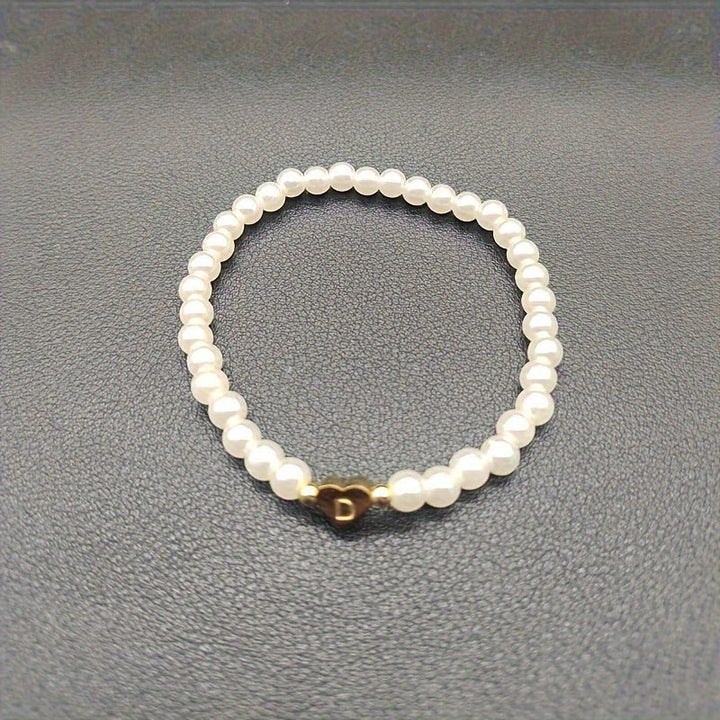 Elegante bracciale con iniziale a forma di cuore (A-Z)