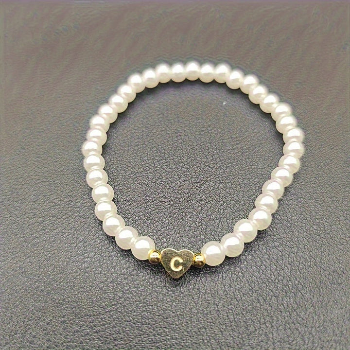 Elegante bracciale con iniziale a forma di cuore (A-Z)