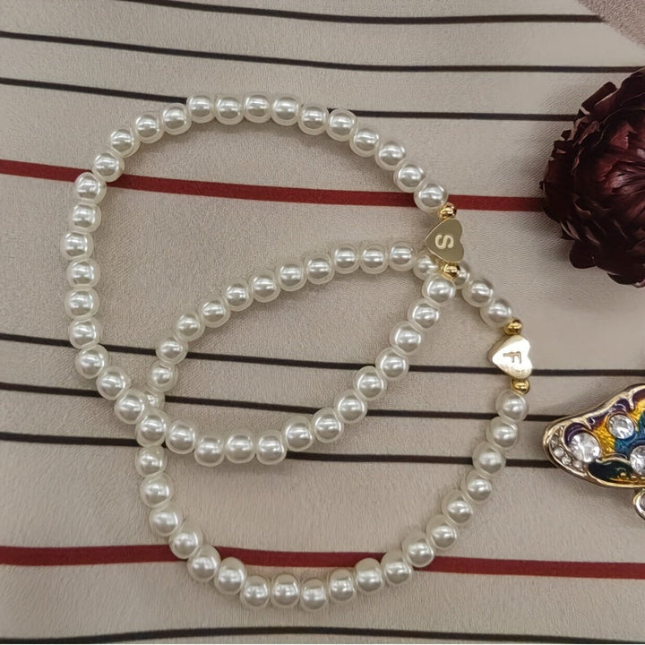 Elegante bracciale con iniziale a forma di cuore (A-Z)