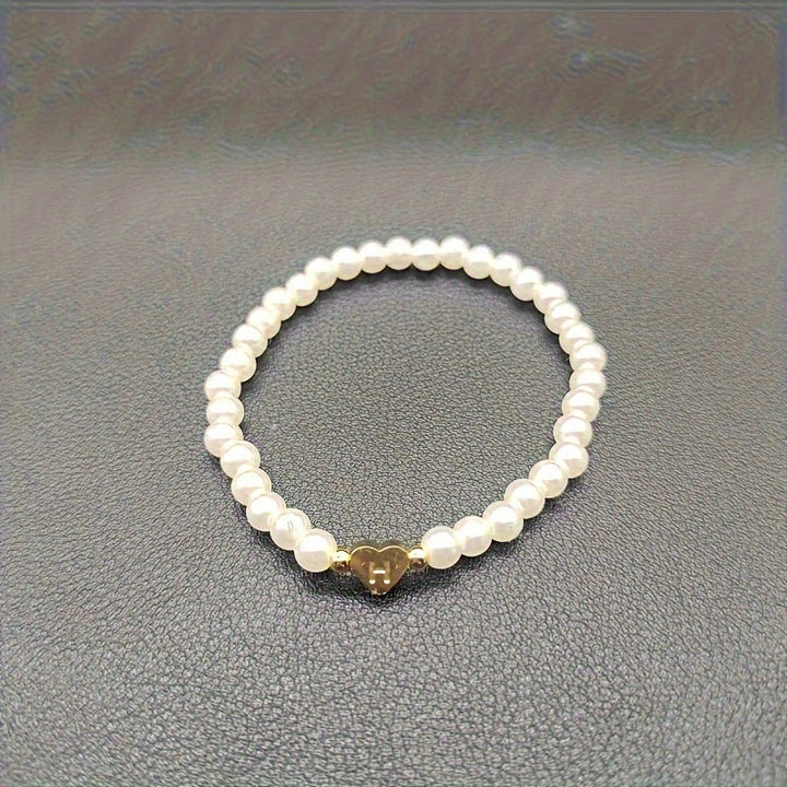 Elegante bracciale con iniziale a forma di cuore (A-Z)
