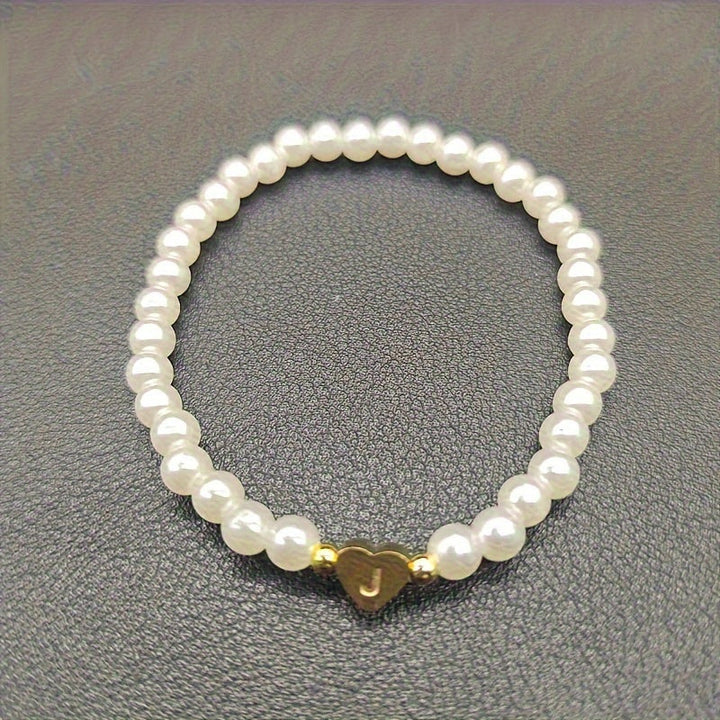 Elegante bracciale con iniziale a forma di cuore (A-Z)