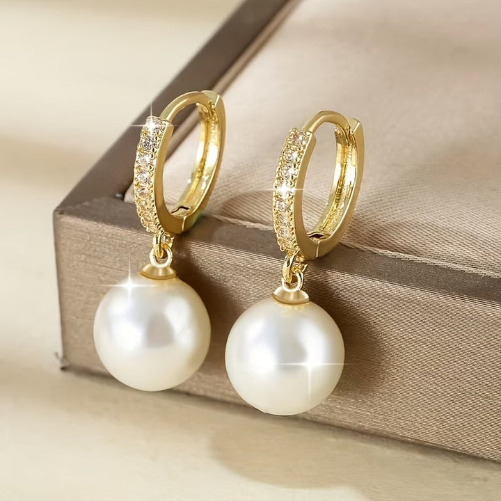 Boucles d'oreilles pendantes perles modernes