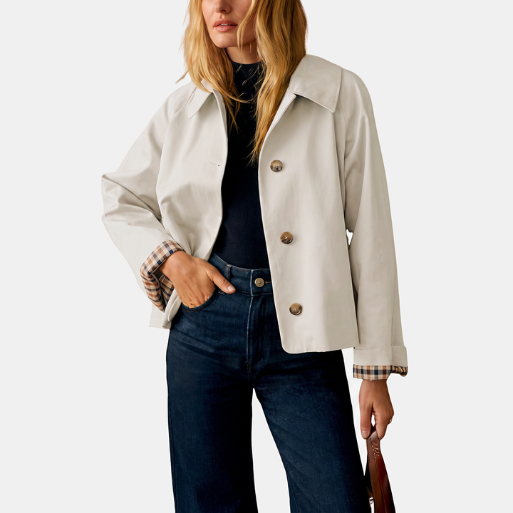 Trench-coat court pour femme avec doublure à carreaux et boutons dorés
