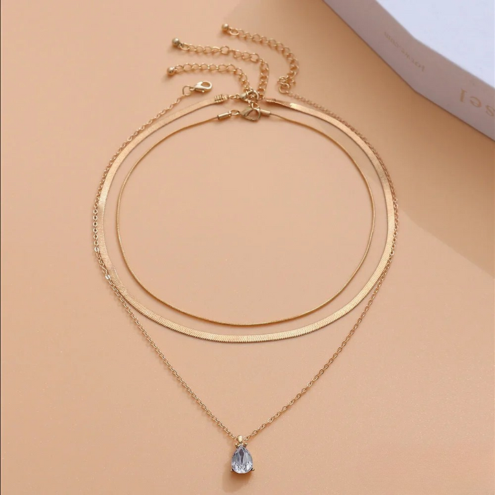 Collier multirang avec pendentif en zircone doré