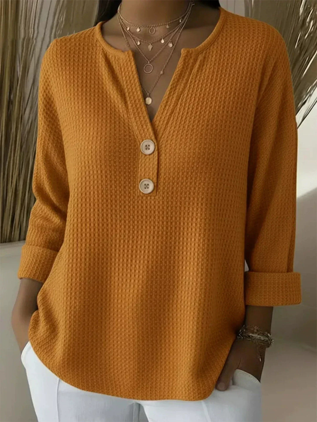 Lucía | Maglia Henley a nido d'ape con bottoni