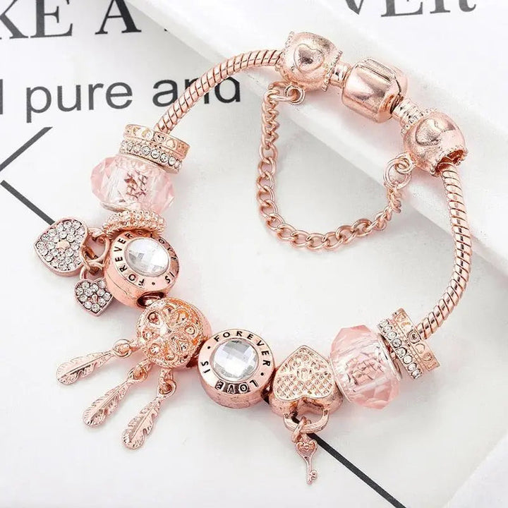 Bracciale acchiappasogni rosa con charms in argento inclusi