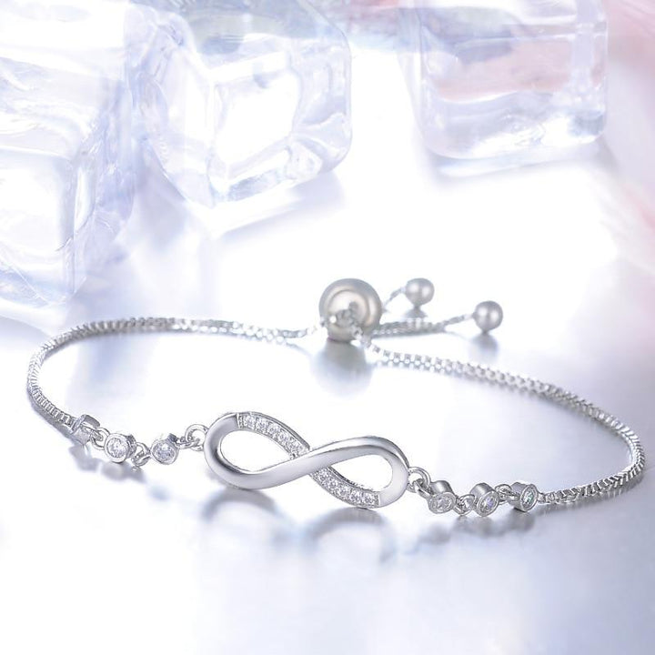 Elegante bracciale regolabile in oro rosa a forma di infinito