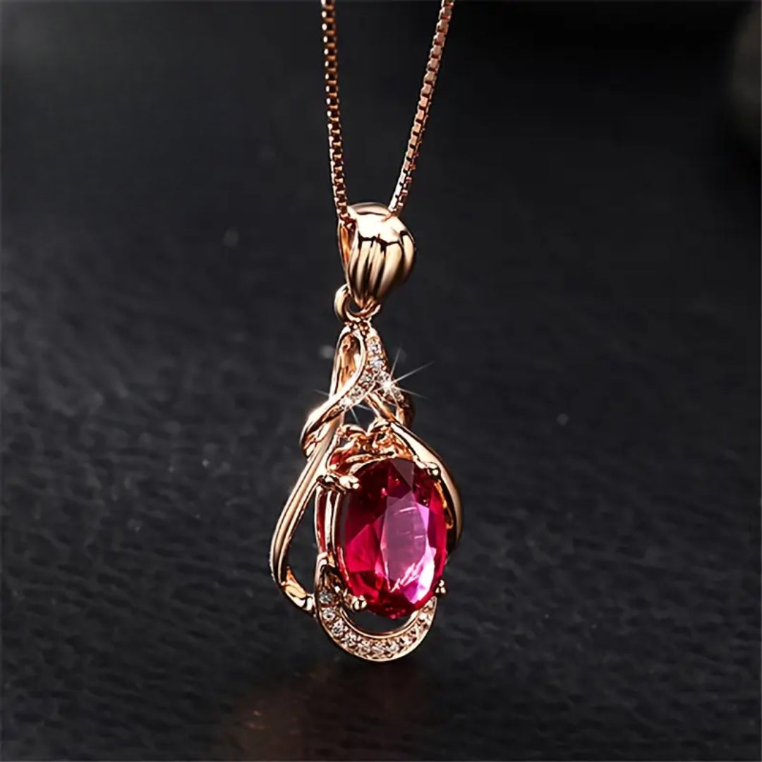 Elegante collana con cristalli rossi e oro