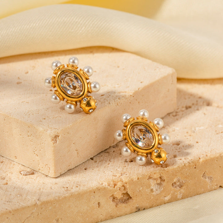 Eleganti orecchini in oro con perla