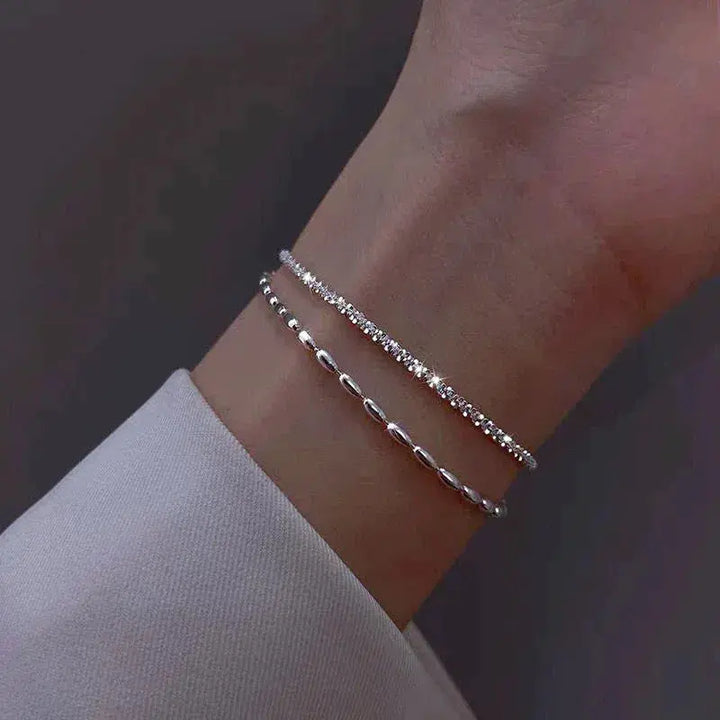 Elegante set di bracciali in argento con zirconi