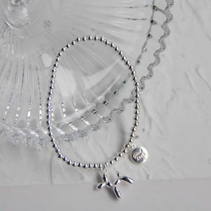 bracelet rond avec chien ballon