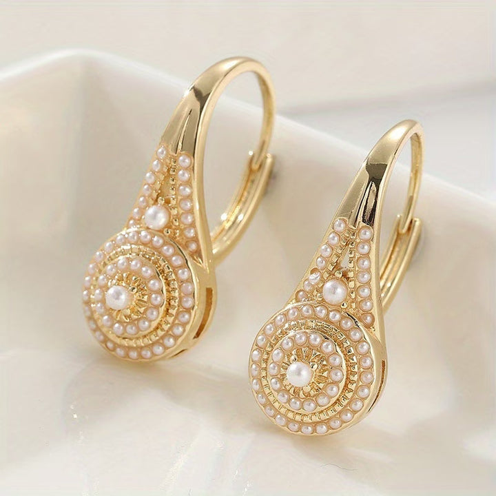 Eleganti orecchini con perle