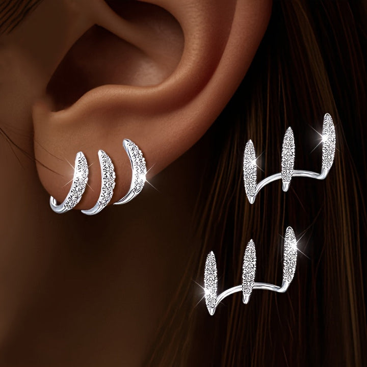Elegante Ohrringe mit drei Krappen und Strass