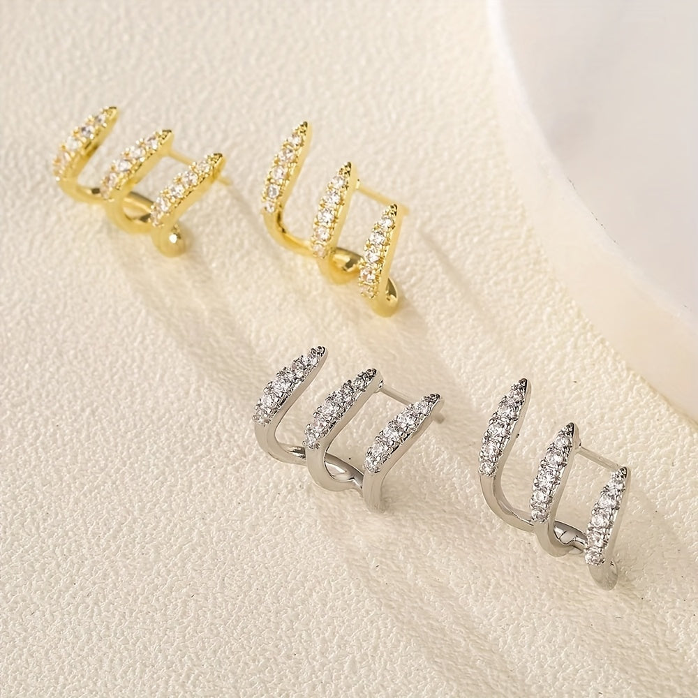 Elegante Ohrringe mit drei Krappen und Strass