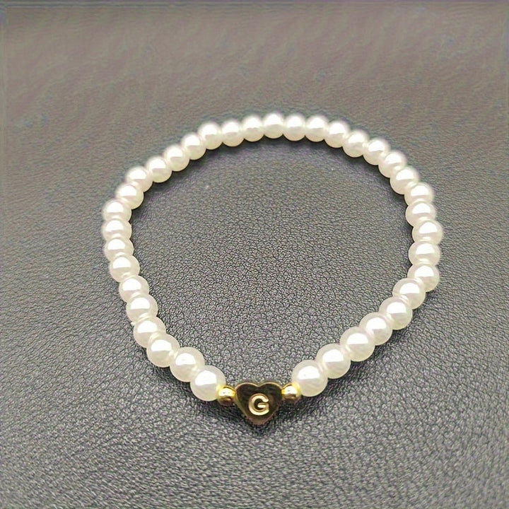Elegante bracciale con iniziale a forma di cuore (A-Z)