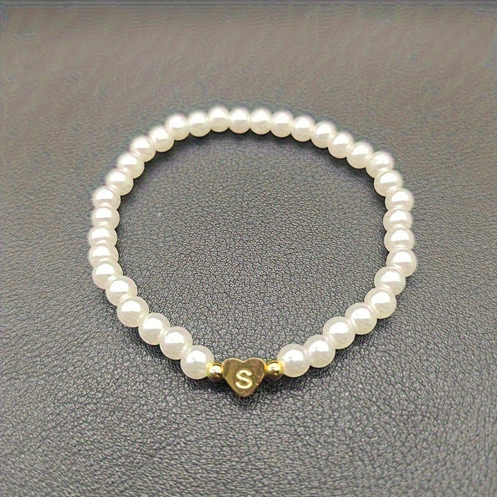 Elegante bracciale con iniziale a forma di cuore (A-Z)