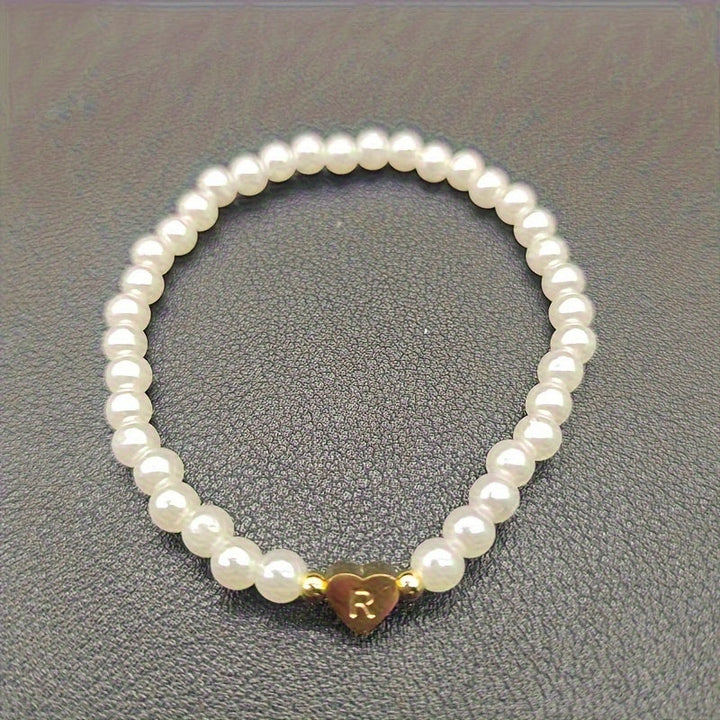 Elegante bracciale con iniziale a forma di cuore (A-Z)