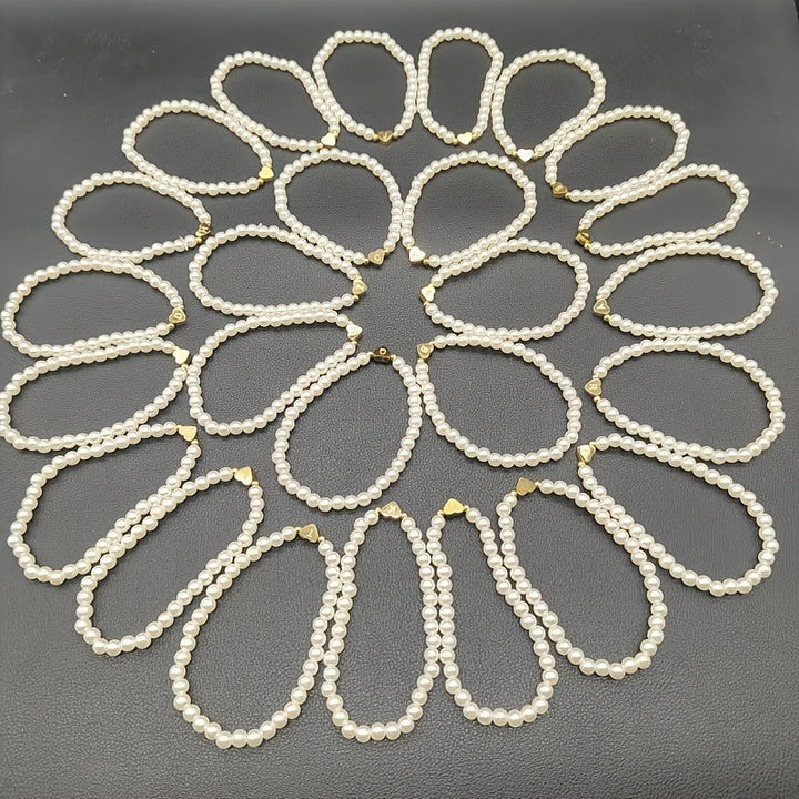 Elegante bracciale con iniziale a forma di cuore (A-Z)