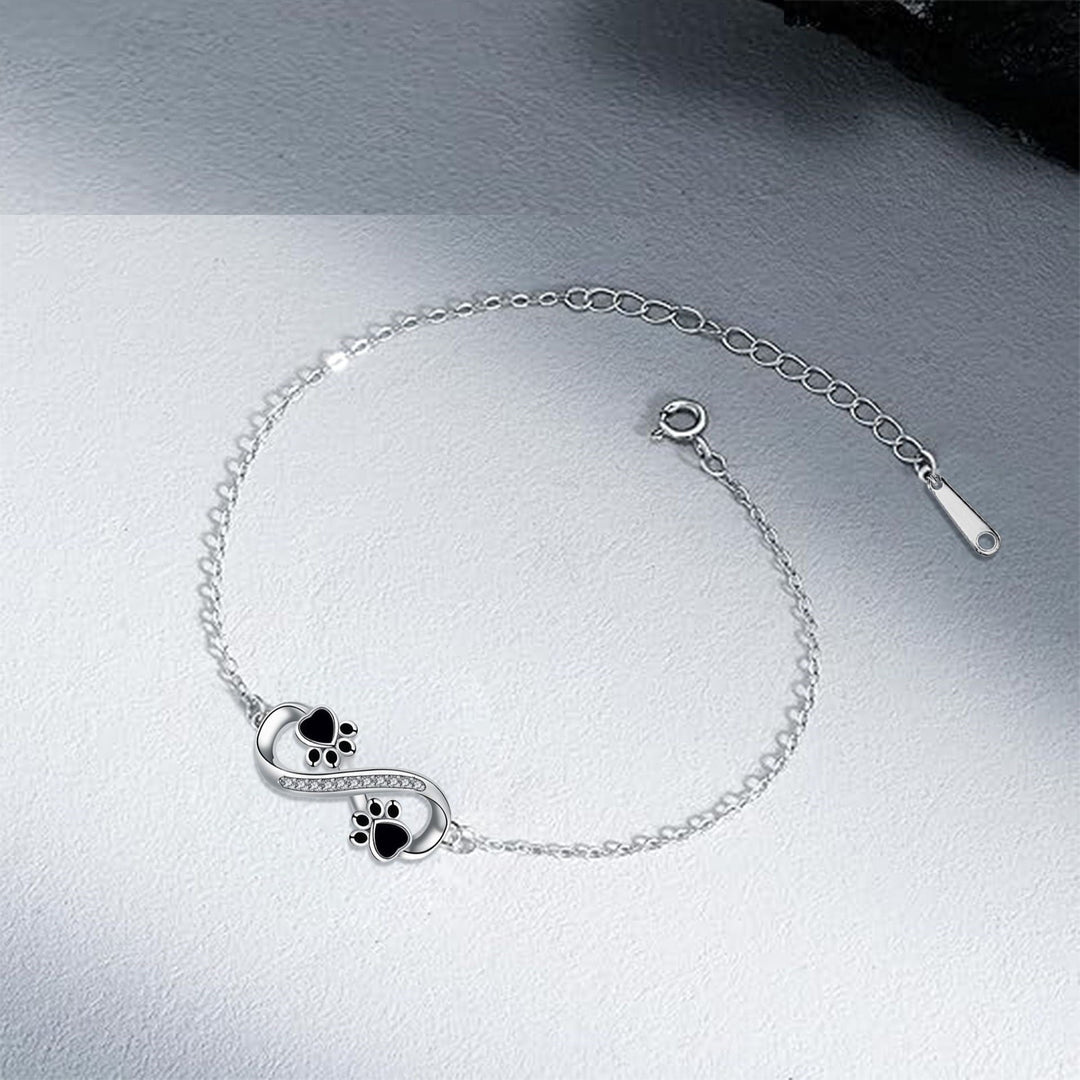Bracelet avec symbole de l'infini, pendentif avec empreinte de patte et zircone