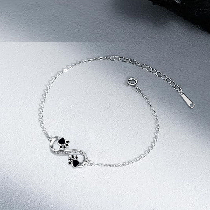 Bracelet avec symbole de l'infini, pendentif avec empreinte de patte et zircone