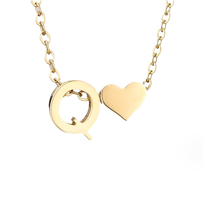 Collana con iniziale senza tempo e ciondolo a cuore
