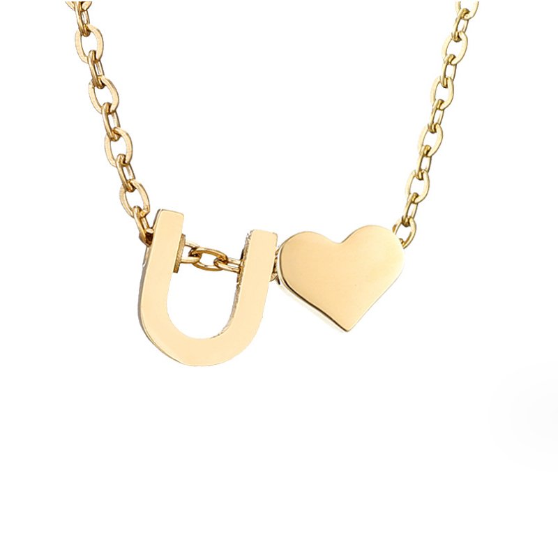 Collana con iniziale senza tempo e ciondolo a cuore