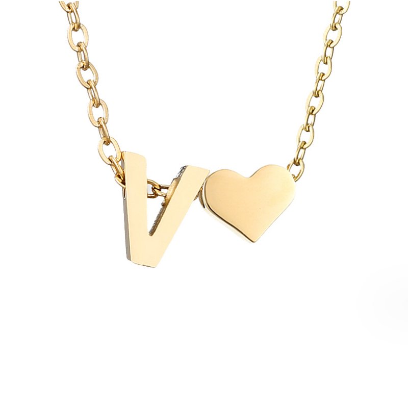 Collana con iniziale senza tempo e ciondolo a cuore