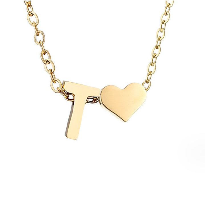 Collana con iniziale senza tempo e ciondolo a cuore