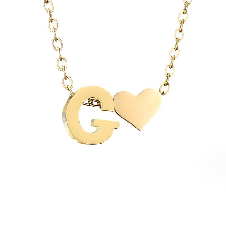 Collana con iniziale senza tempo e ciondolo a cuore