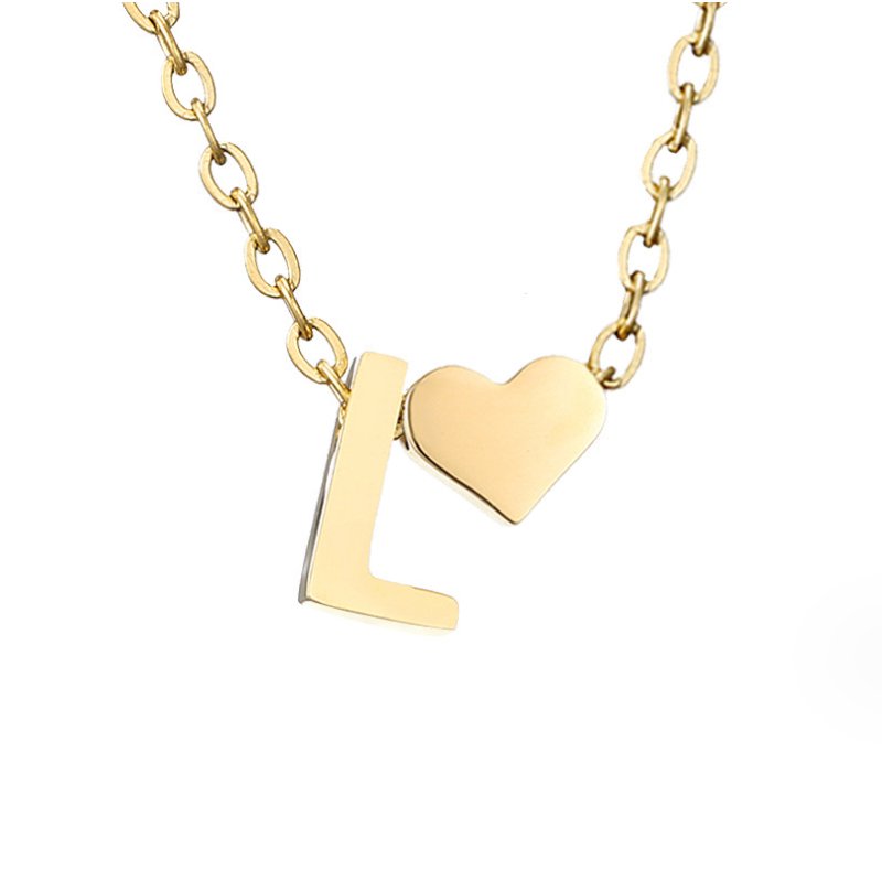 Collana con iniziale senza tempo e ciondolo a cuore