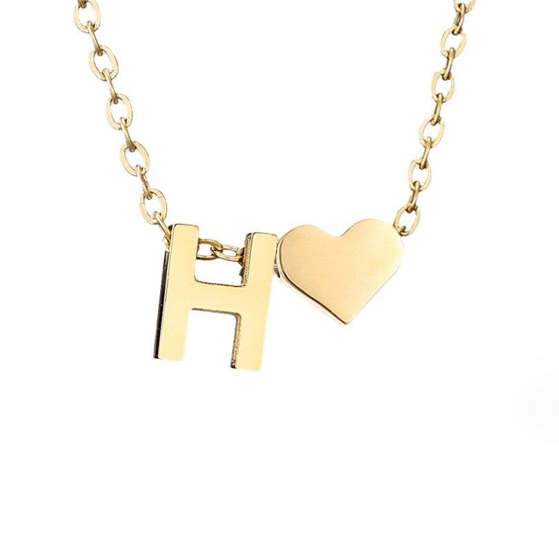 Collana con iniziale senza tempo e ciondolo a cuore