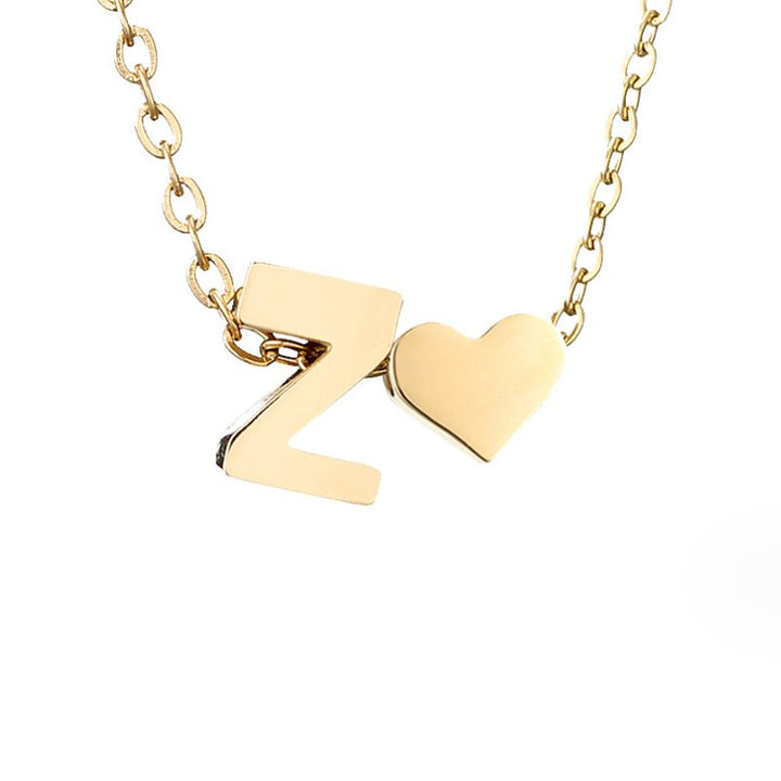 Collana con iniziale senza tempo e ciondolo a cuore