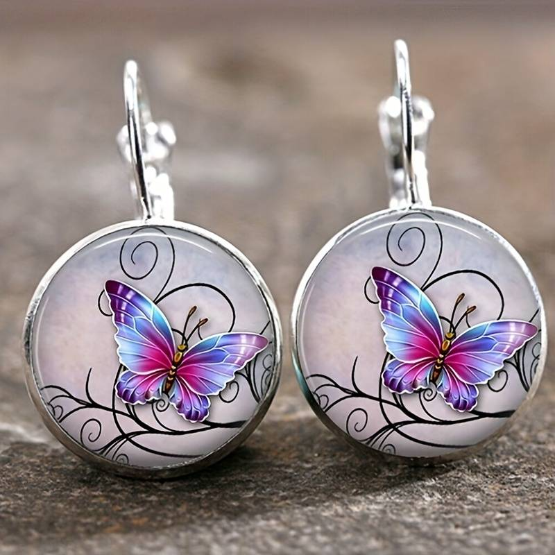 Boucles d'oreilles vintage motif papillon avec cristaux ronds