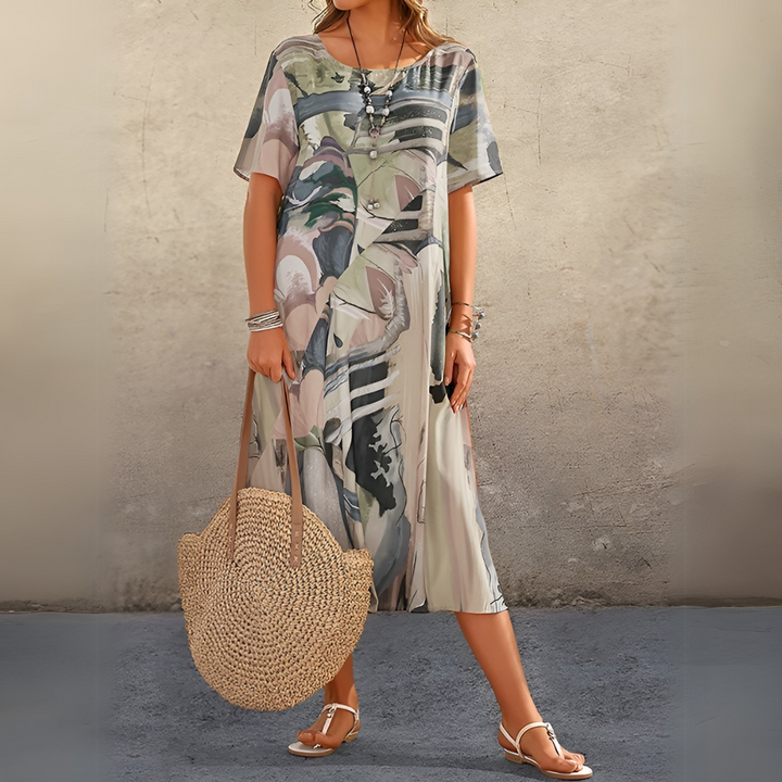 JOELLE | ABITO A FIORI DAL TAGLIO LEGGERO ED ELEGANTE
